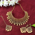 Traditional Rajwadi heavy golden choker necklace with intricate craftsmanship.
