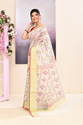 Women wearing a white printed cotton blend saree with delicate embellishments