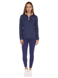 Woman wearing navy blue performance quarter zip top with pink inner collar detail
