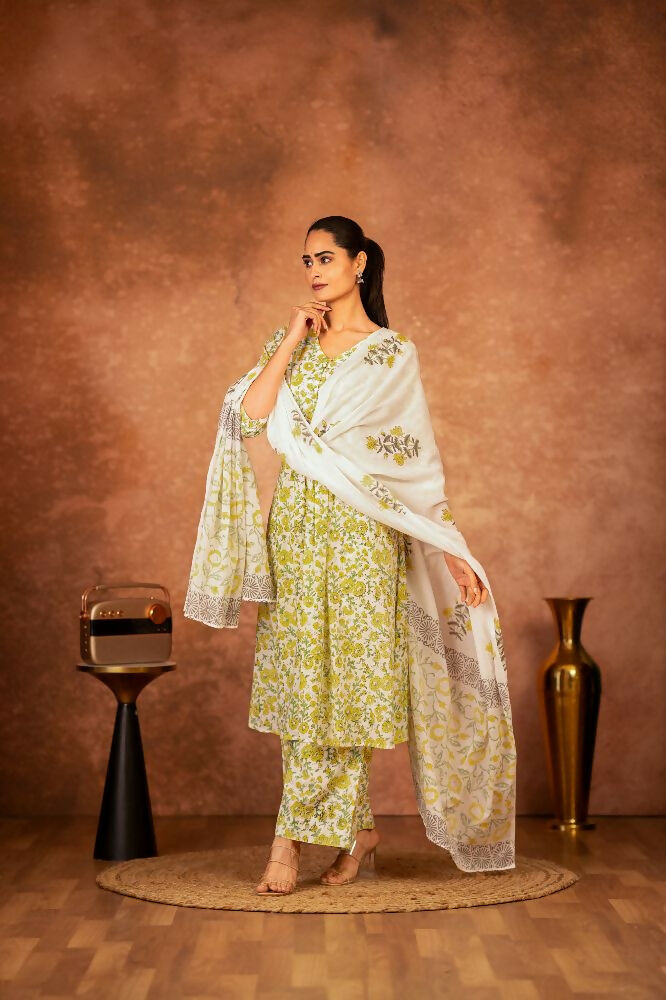 Model wearing a vibrant yellow hand block printed cotton suit set