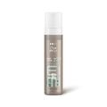 Wella Eimi Nutricurls Soft Twirl 72H Anti-Frizz Foam in a 6.7 oz bottle.