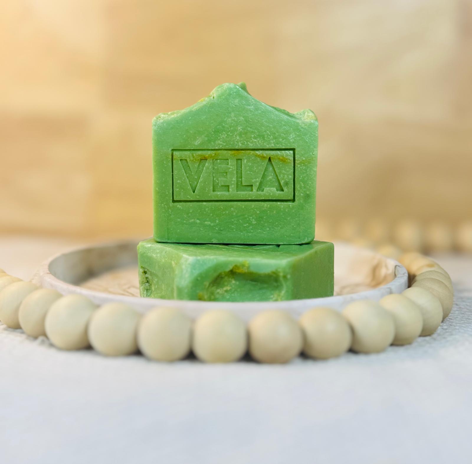 Solid green and cream Eucalyptus Spearmint soap bar with a minimalist bohemian design.