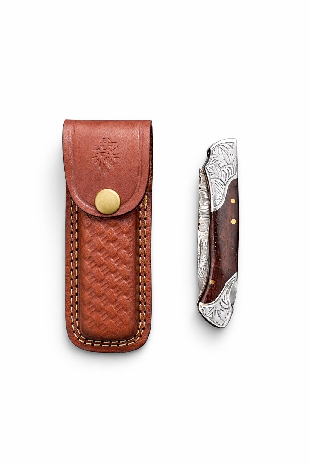 Titan Ironcrest Damascus folding knife with brown handle and protective leather sheath.