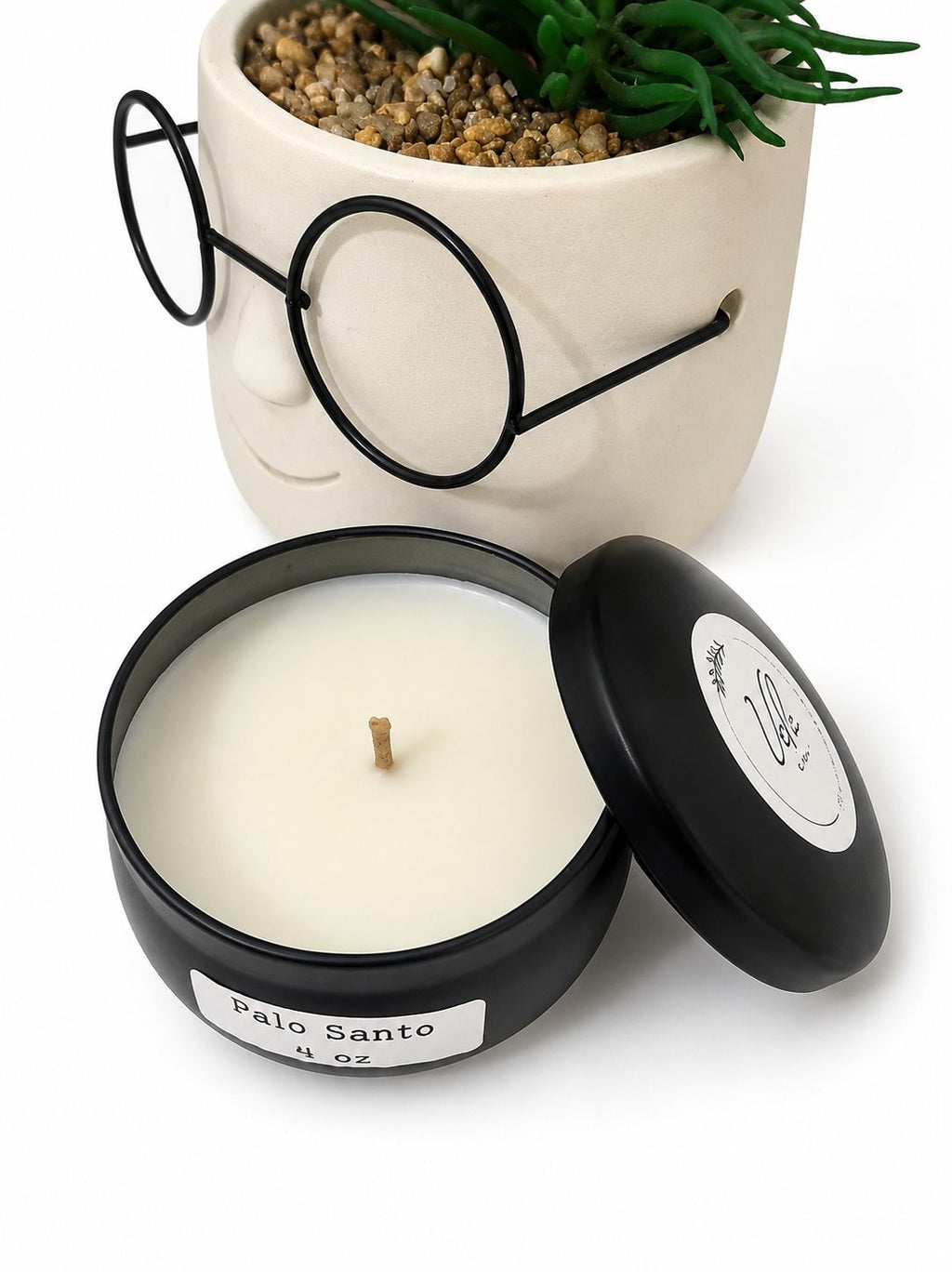 Palo Santo soy wax candle in a 4 oz size with a minimalist modern aesthetic.