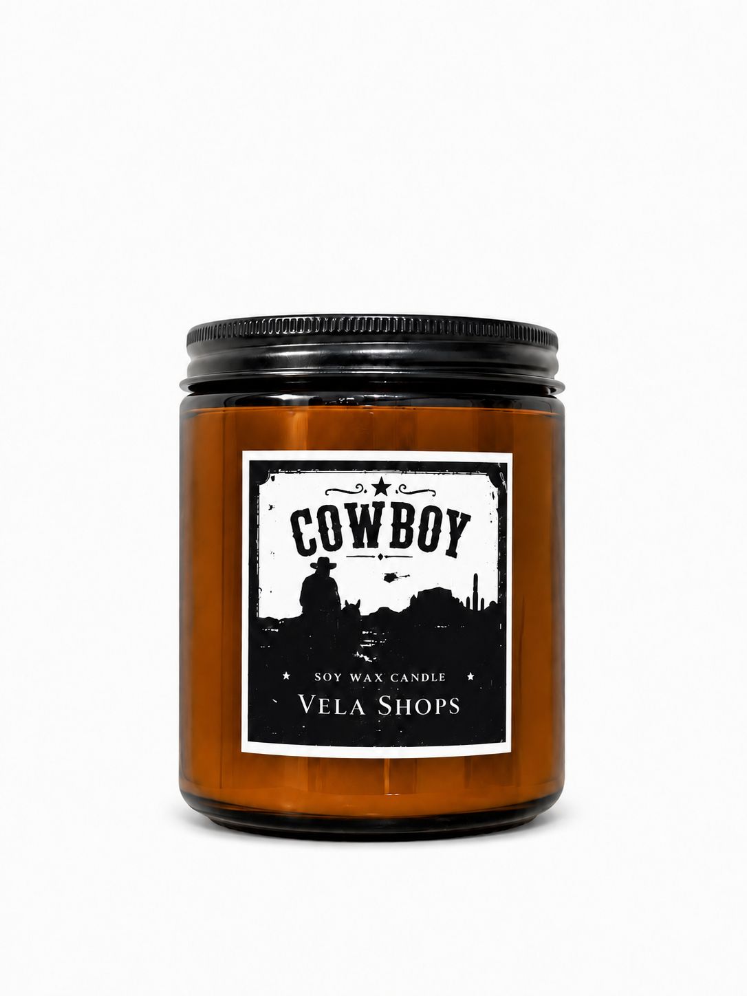 A rustic Cowboy themed soy wax candle in a dark glass jar, styled for western or lodge home decor.