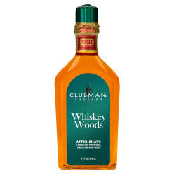 Bottle of Clubman Reserve Whiskey Woods After Shave 6oz featuring a masculine, liquor-inspired aesthetic.