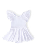 Young girl wearing a white short-sleeve flutter leotard with a skirted bottom