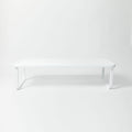 A white stackable wooden shoe shelf on a white background with dimension annotations