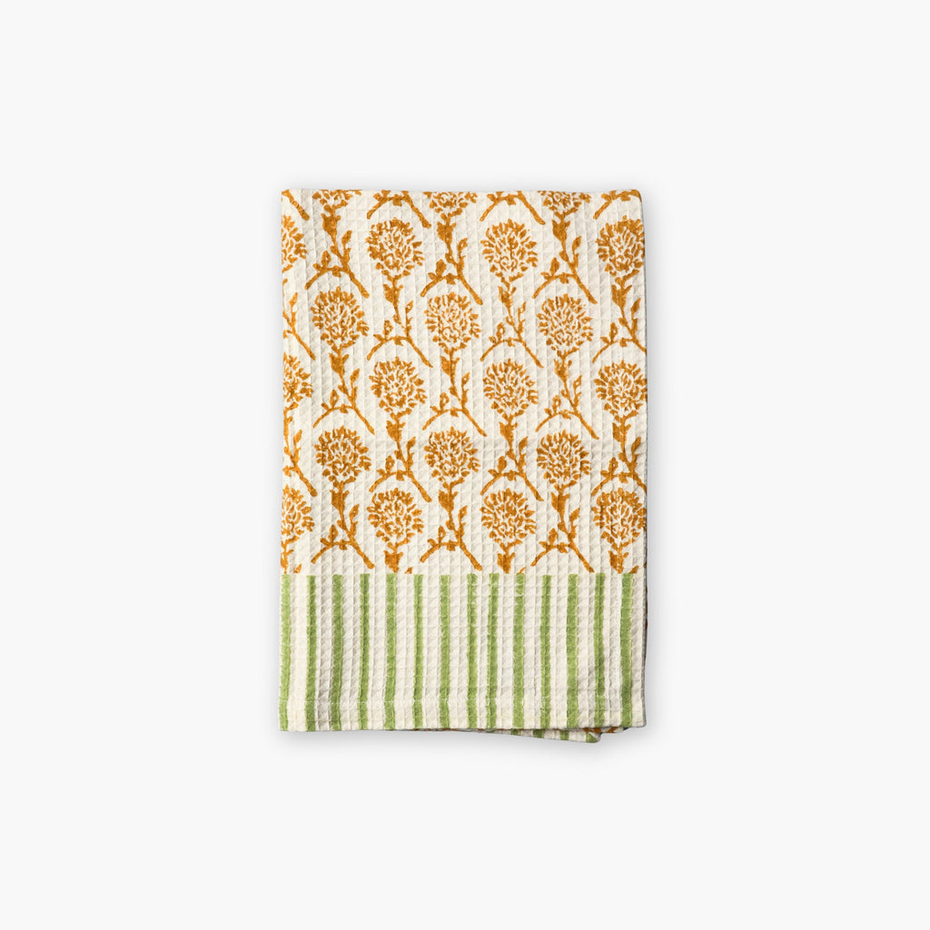 Nikhar organic cotton waffle weave kitchen towel in tawny orange with paragon stripes