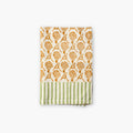 Nikhar organic cotton waffle weave kitchen towel in tawny orange with paragon stripes