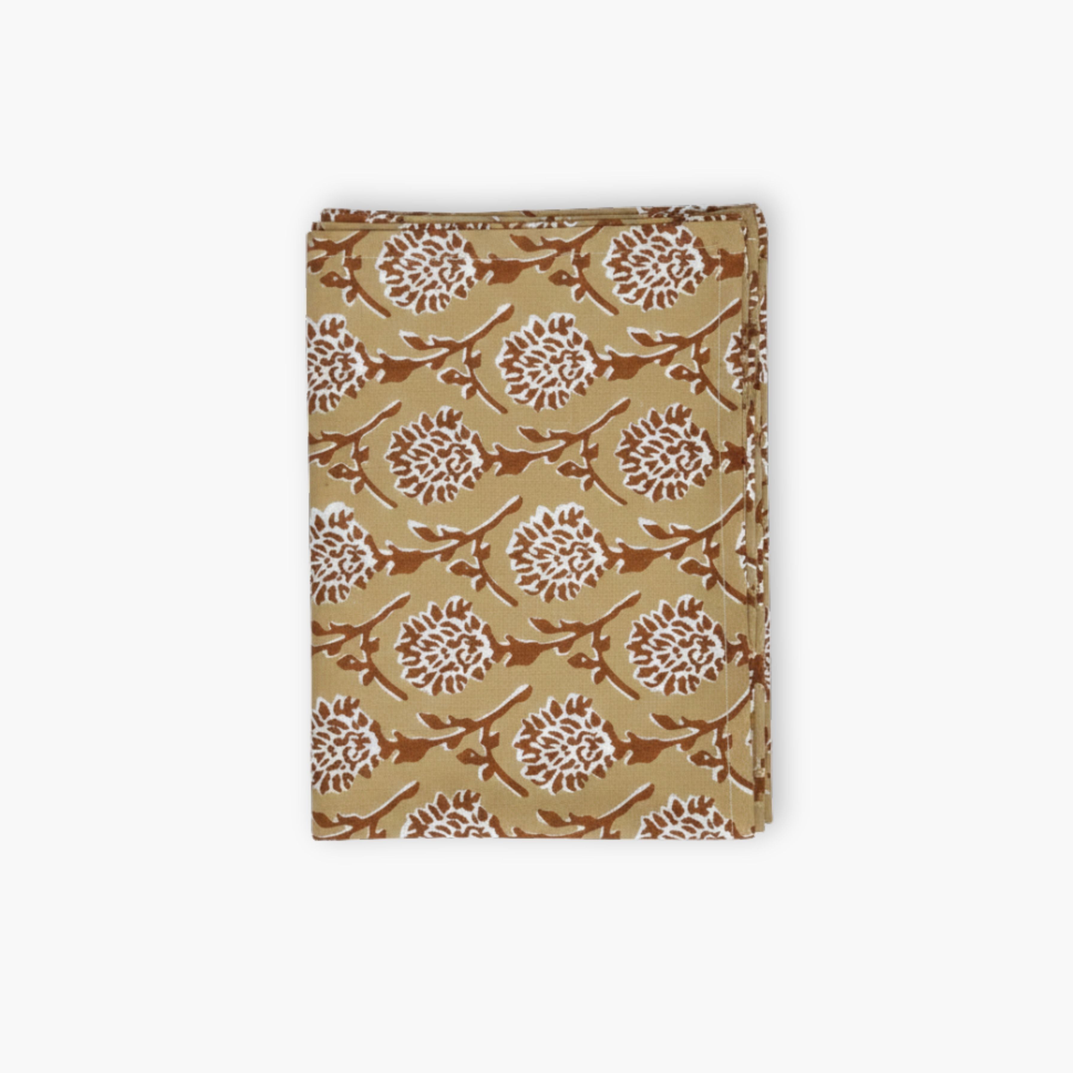 Chai Brown linen table runner featuring intricate Mughal chrysanthemum hand-block print