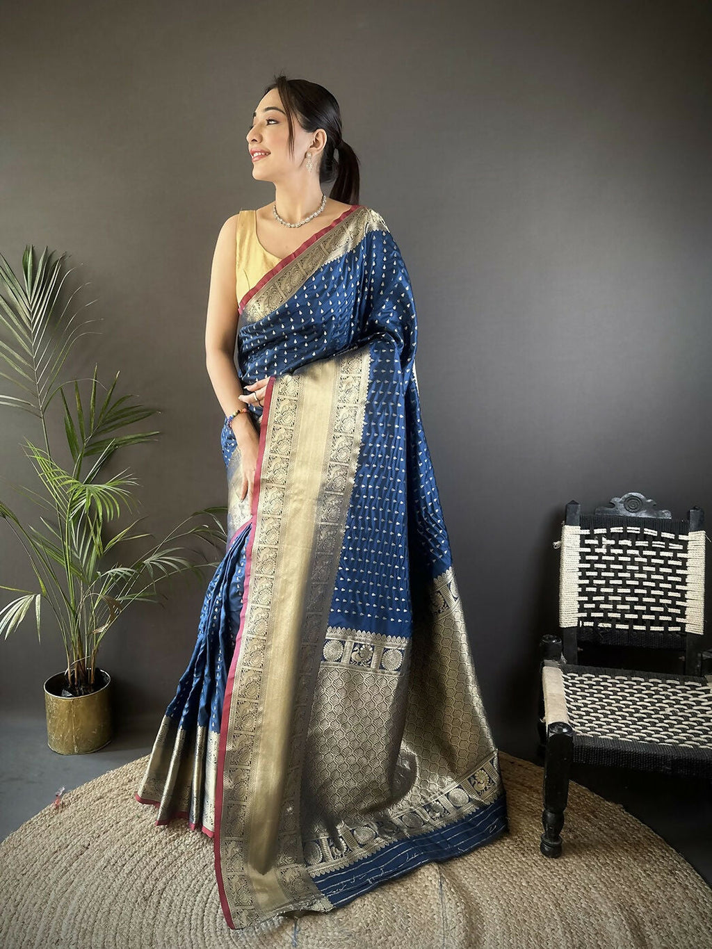 Navy blue Banarasi soft silk saree with small butti pattern and unstitched blouse