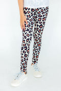 Young girl wearing high-waisted leopard print leggings with a slim fit