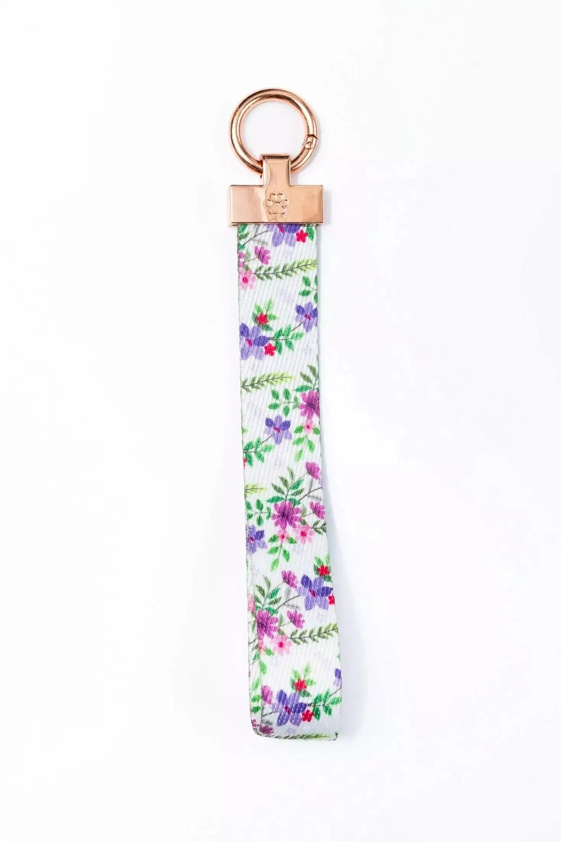 Wildflower Meadow fabric wristlet keychain with floral print and rose gold hardware featuring a paw print and heart engraving.