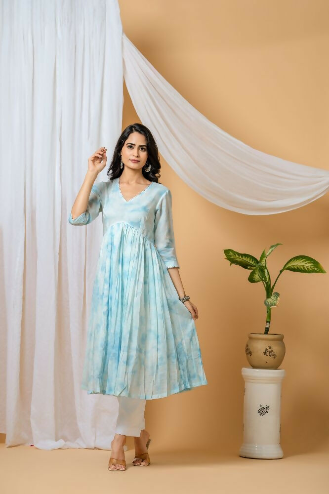 A woman wearing a Blue Tie & Dye Cotton Kurta Pant Set by Dista