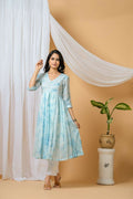 A woman wearing a Blue Tie & Dye Cotton Kurta Pant Set by Dista