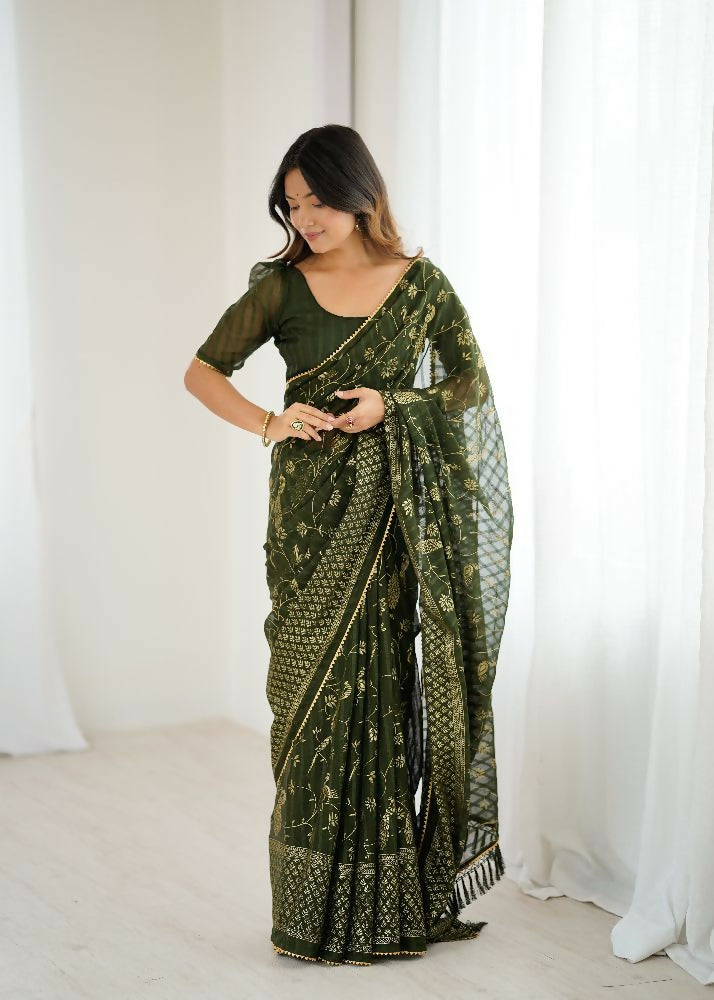 Mehendi green georgette saree with gold foil work and decorative Zalar lace border.