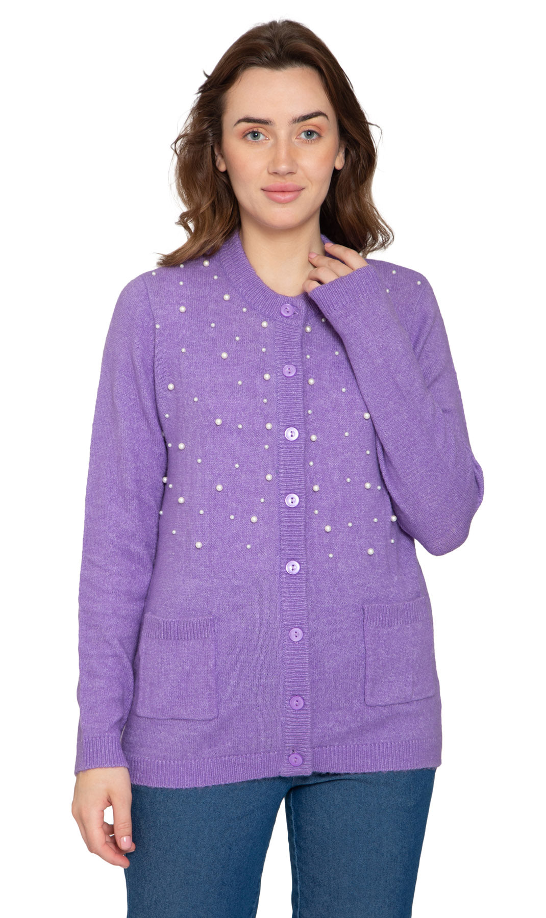 Woman wearing a solid color cashmere-like knit cardigan with faux pearl buttons in purple