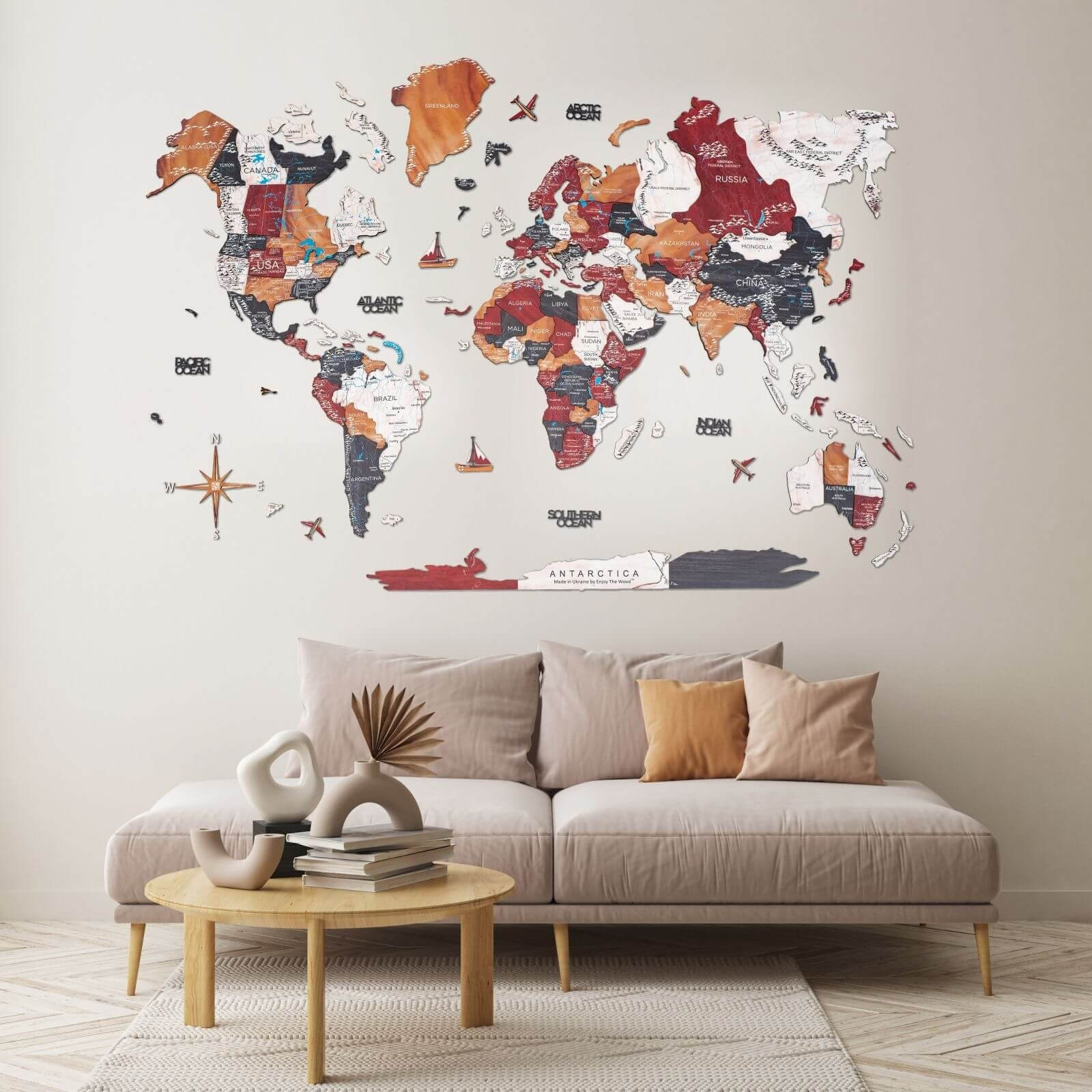3D Wooden World Map in Onyx color displayed in a cozy den