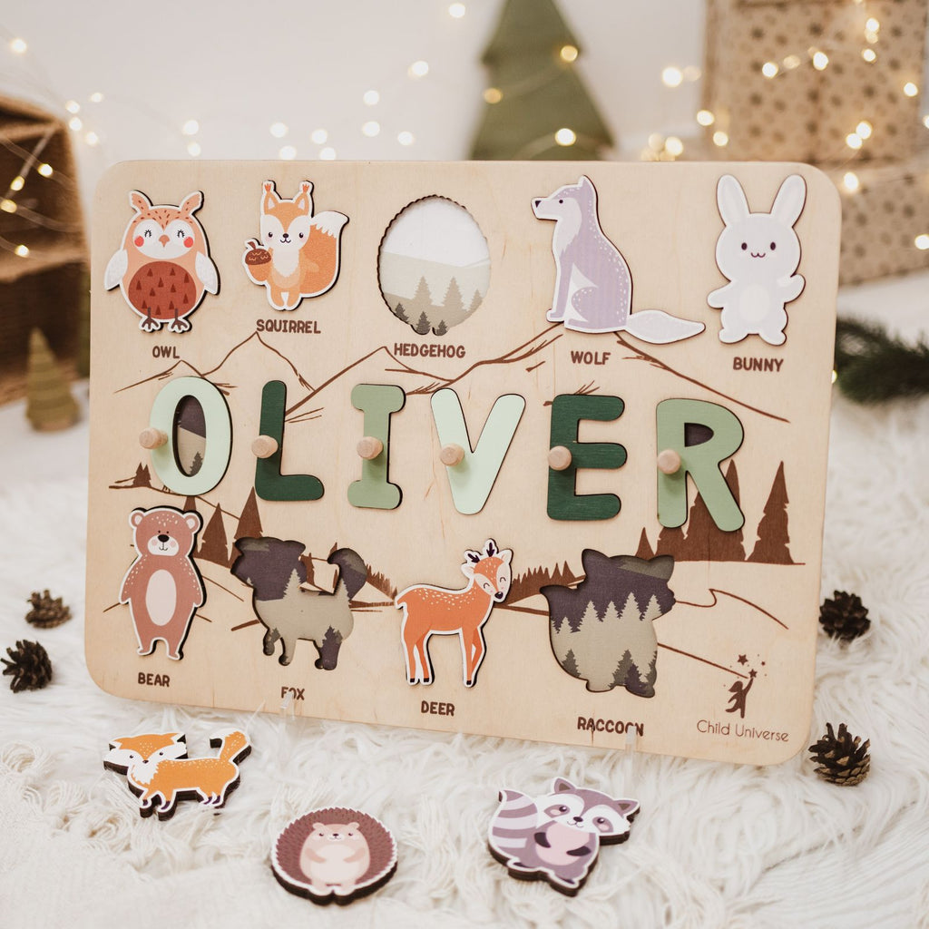 Personalized wooden woodland-themed name puzzle board for toddlers on a nursery shelf