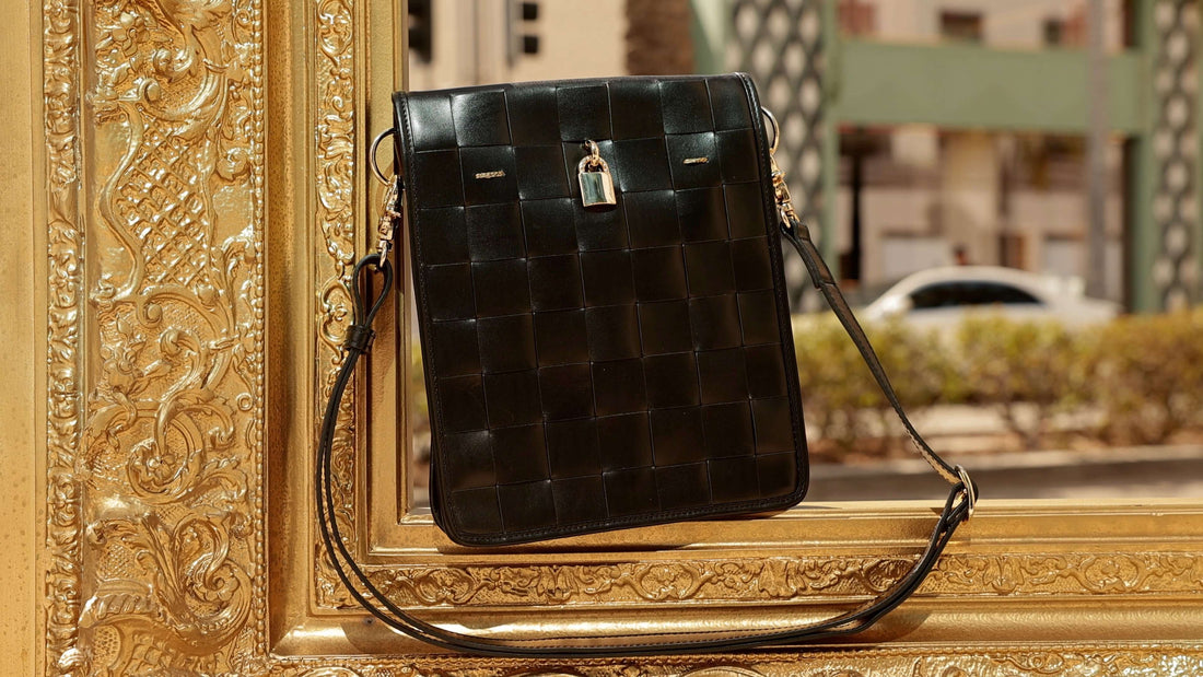 Woven Leather Crossbody Bag in Black with Signature Lock - Image 4