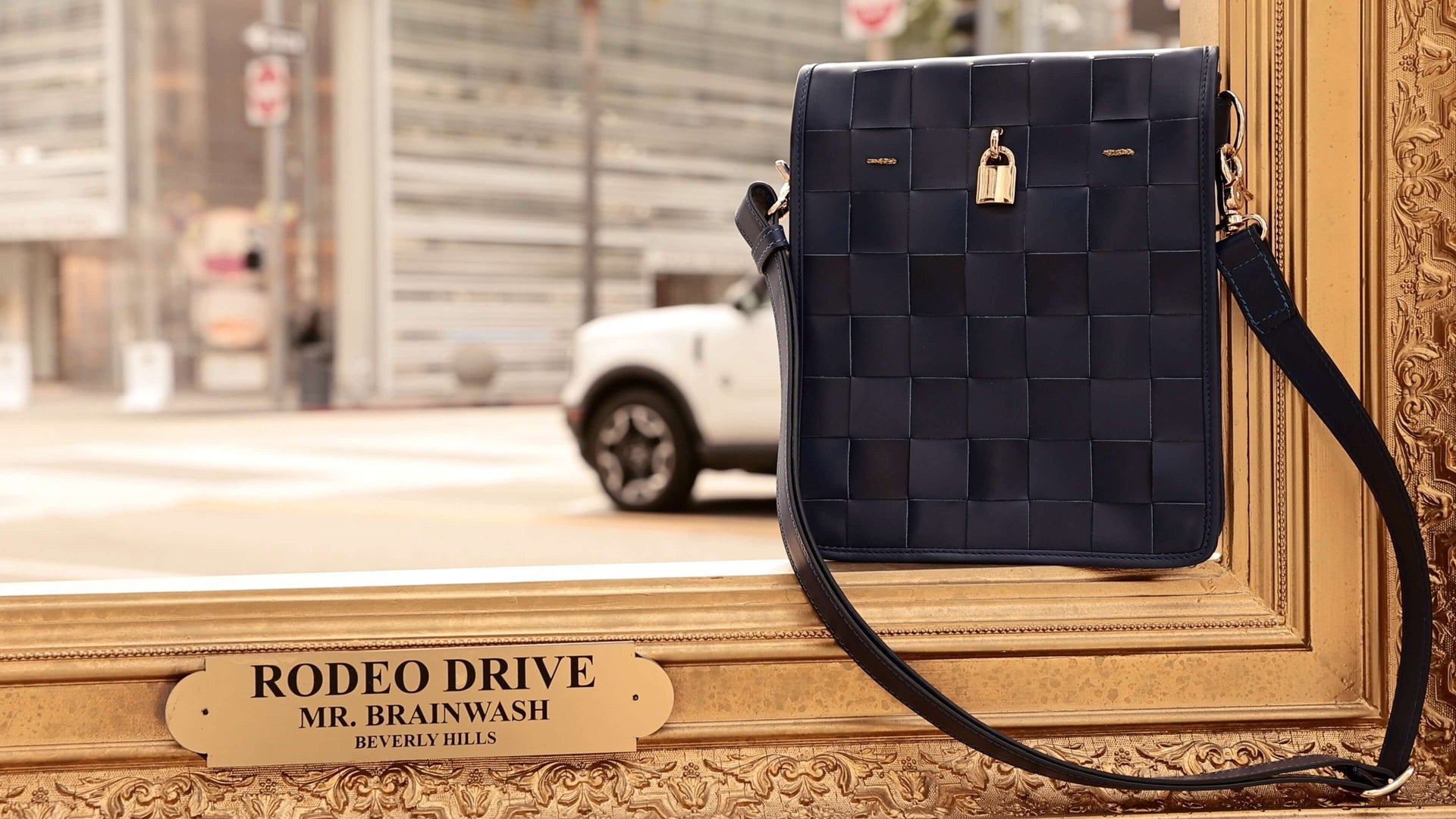 Woven Leather Navy Blue Crossbody Bag with Gold Lock Detail - Image 4