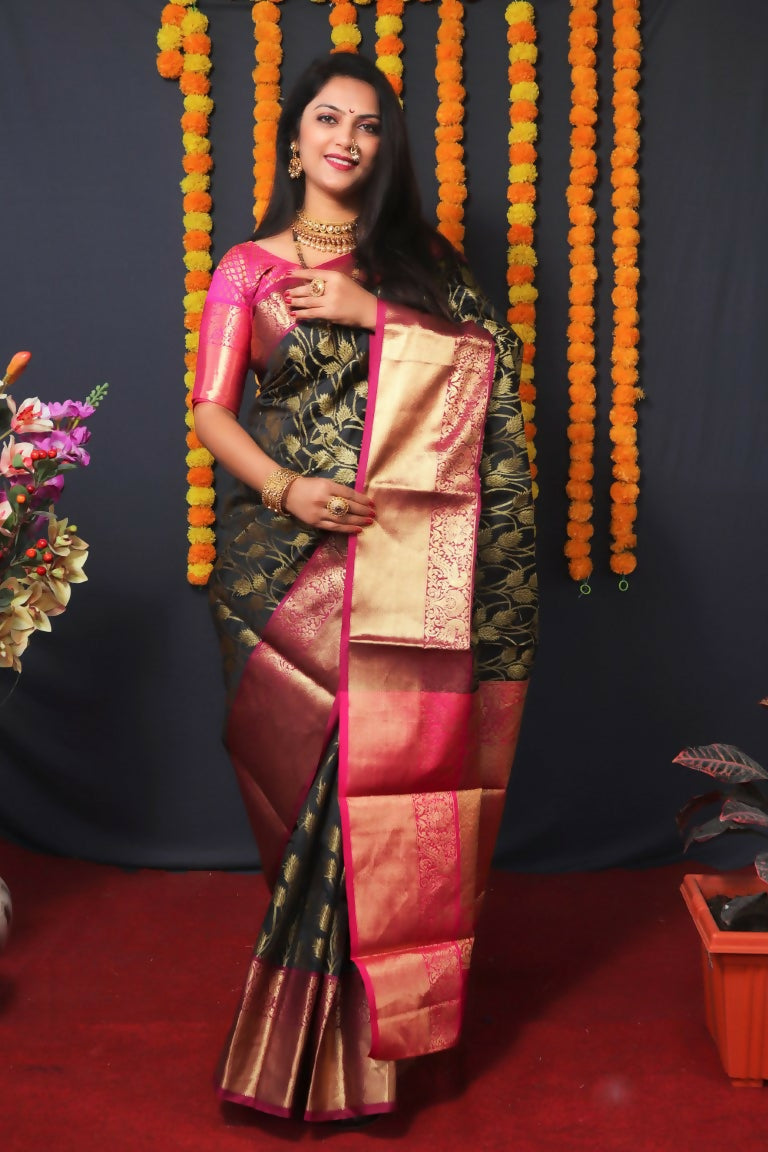 Black Kanjivaram silk saree with Zari woven details and pink blouse