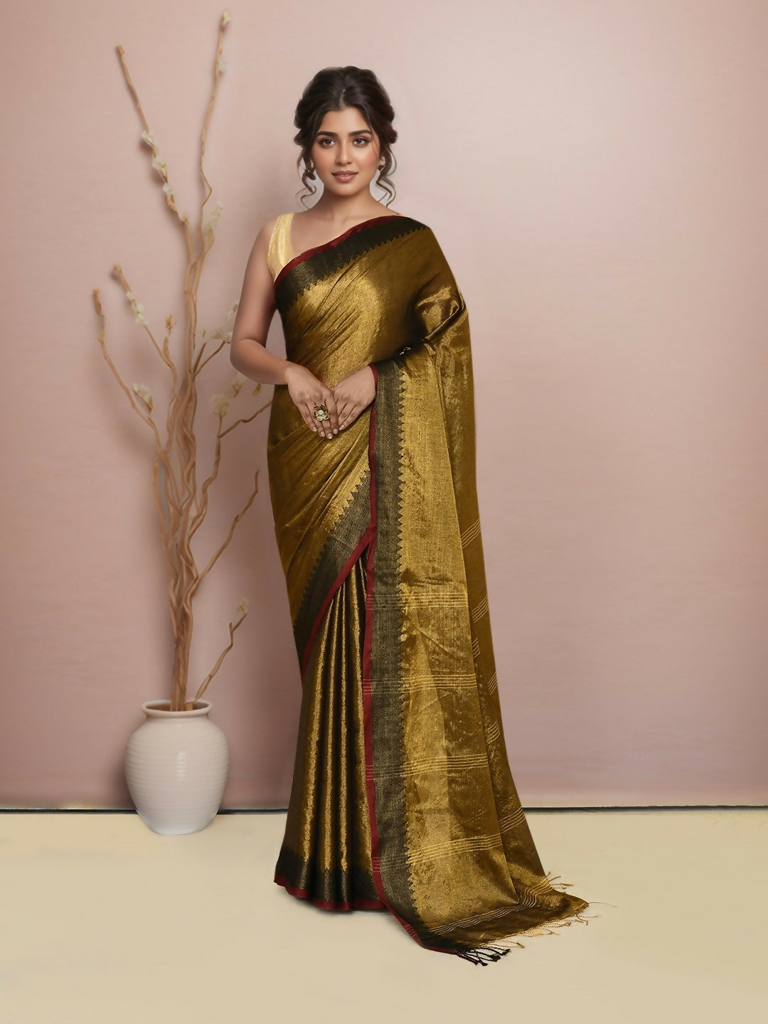 Elegant GoldBlack tissue cotton saree draped in a traditional style