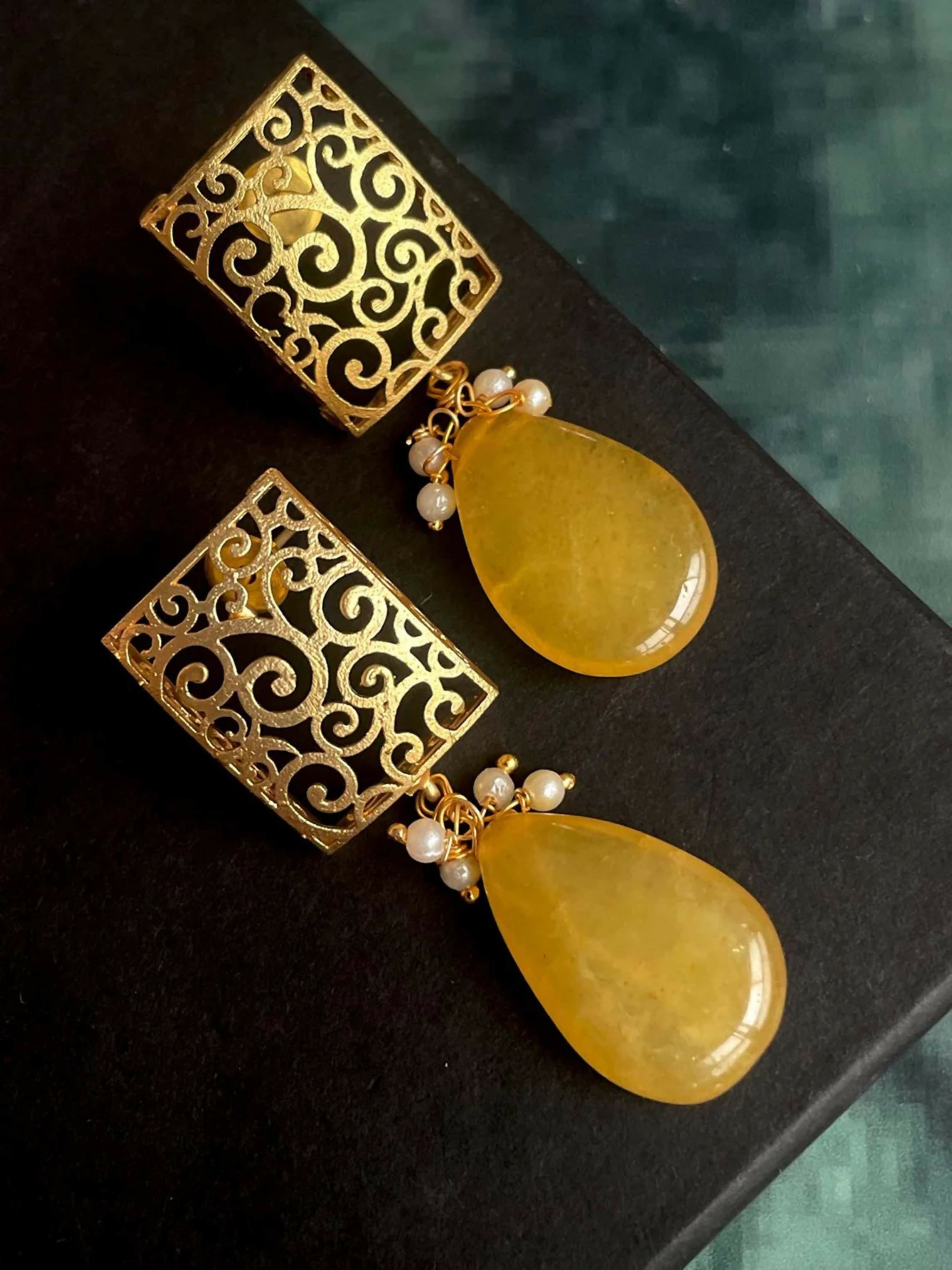 Elegant yellow Monalisa stone earrings with a geometric square designer top in brass.