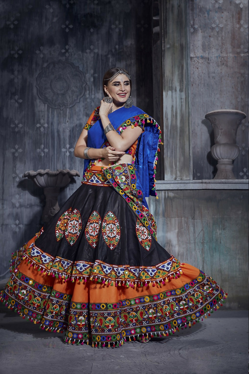 Black and Orange Art Silk Navratri Lehenga Choli with Gamthi work and blue dupatta