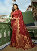 Maroon Organza silk saree with weaving and deep red un-stitched blouse