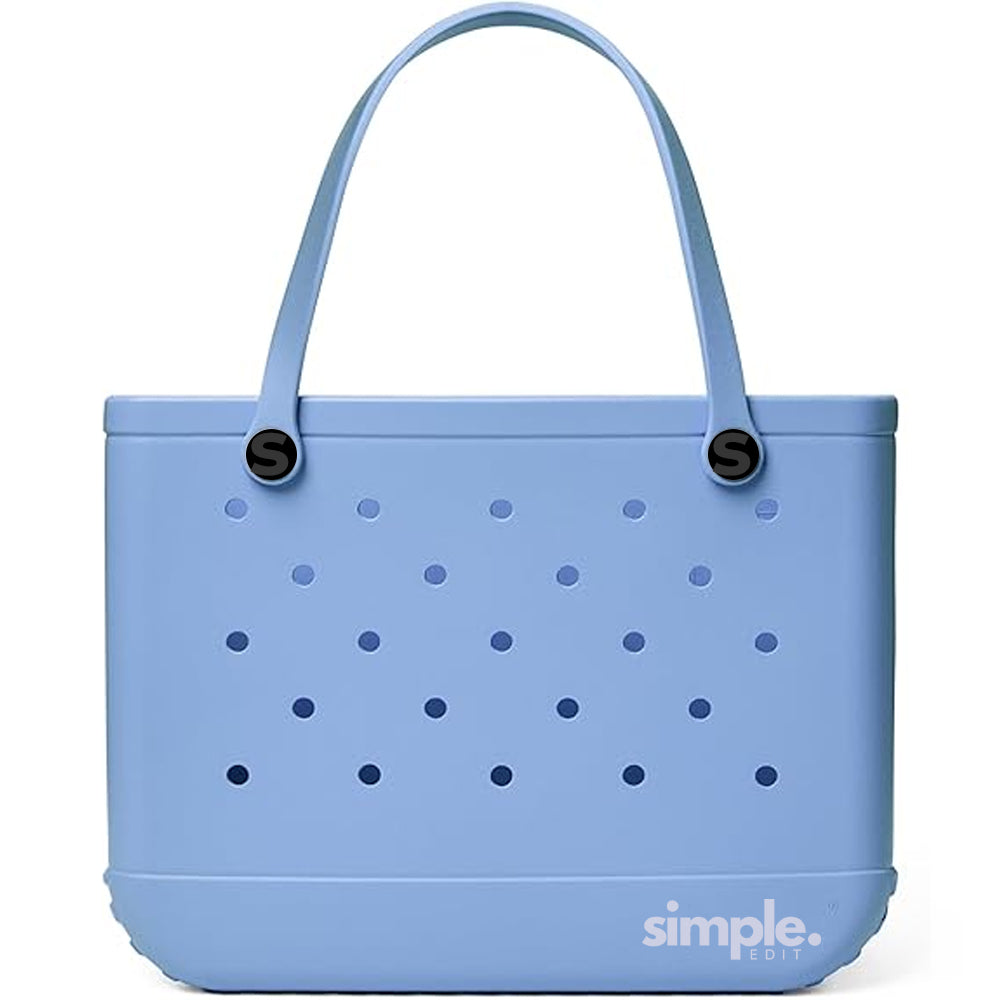 Extra Large EVA tote in Carolina on My Mind Blue standing on a sandy beach