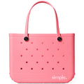 Extra Large EVA tote in bright Pink Lemonade color on a sunny background