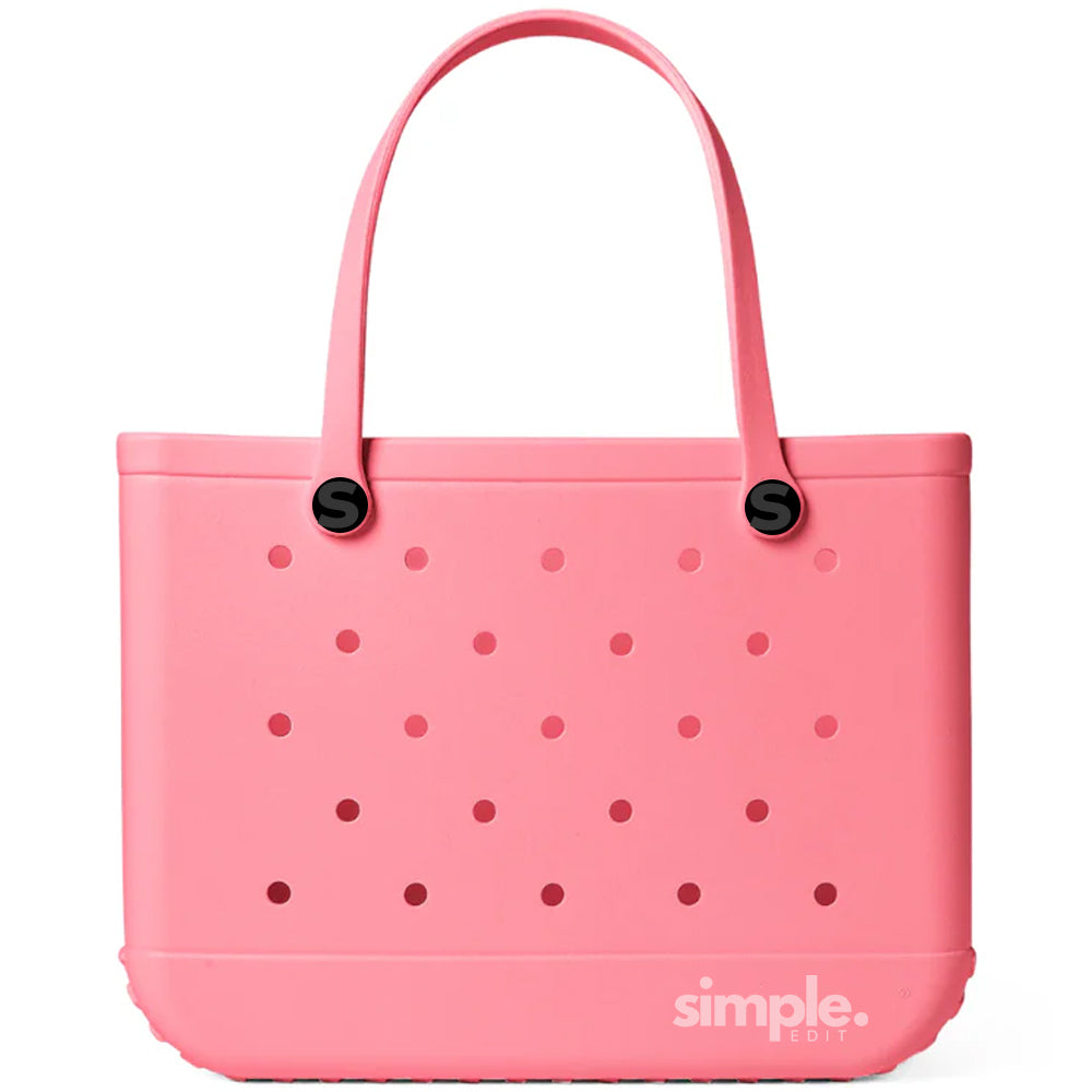 Extra Large EVA tote in bright Pink Lemonade color on a sunny background
