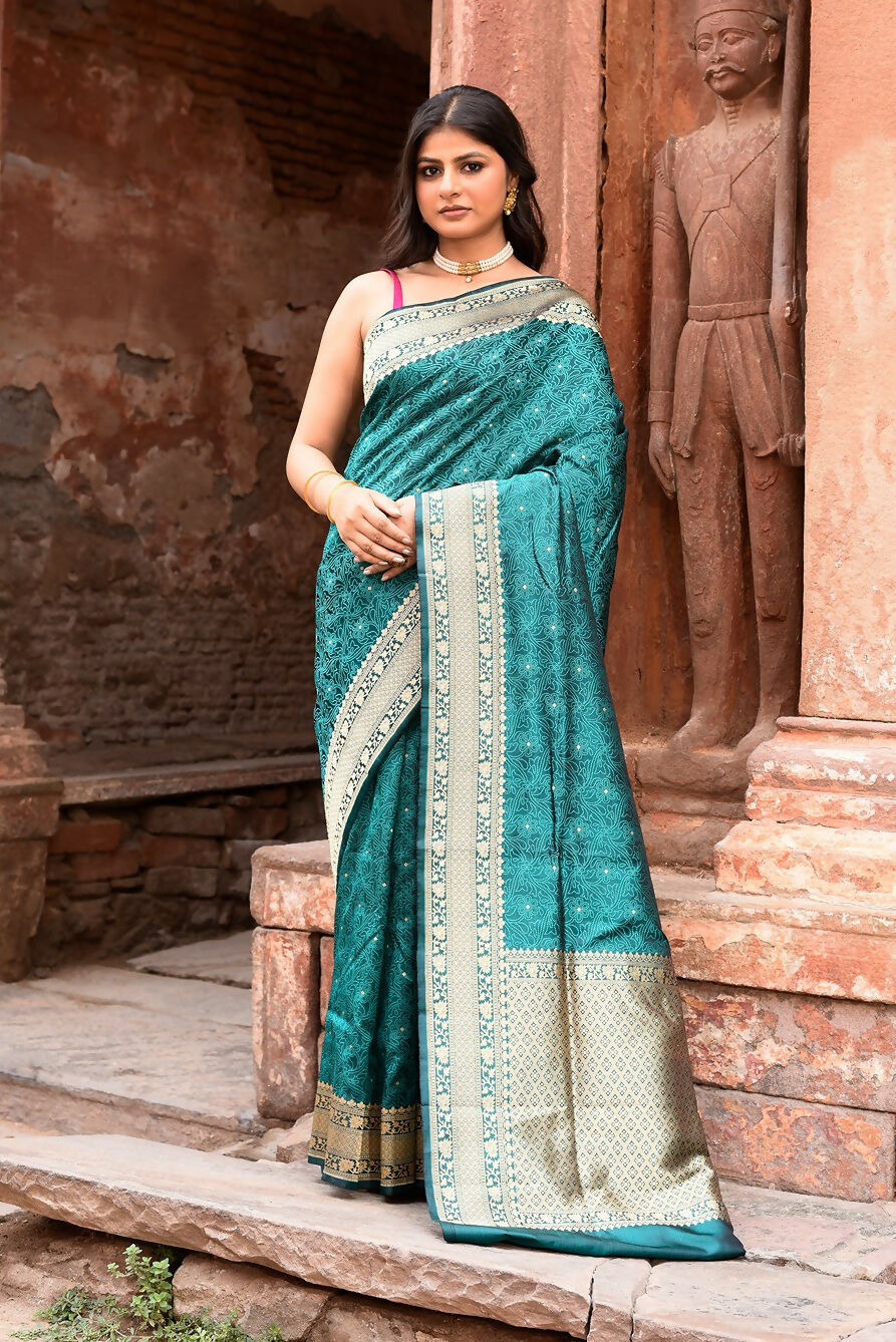 Classic green Banarasi Katan pure handloom silk saree featuring traditional weave