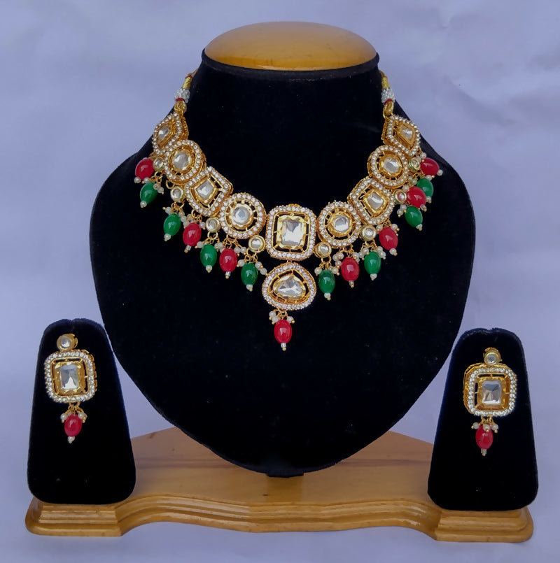 Close-up of a gold-plated Kundan stone necklace set
