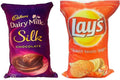 Set of two reversible kids' cushions featuring Dairy Milk and Red Lays snack designs.