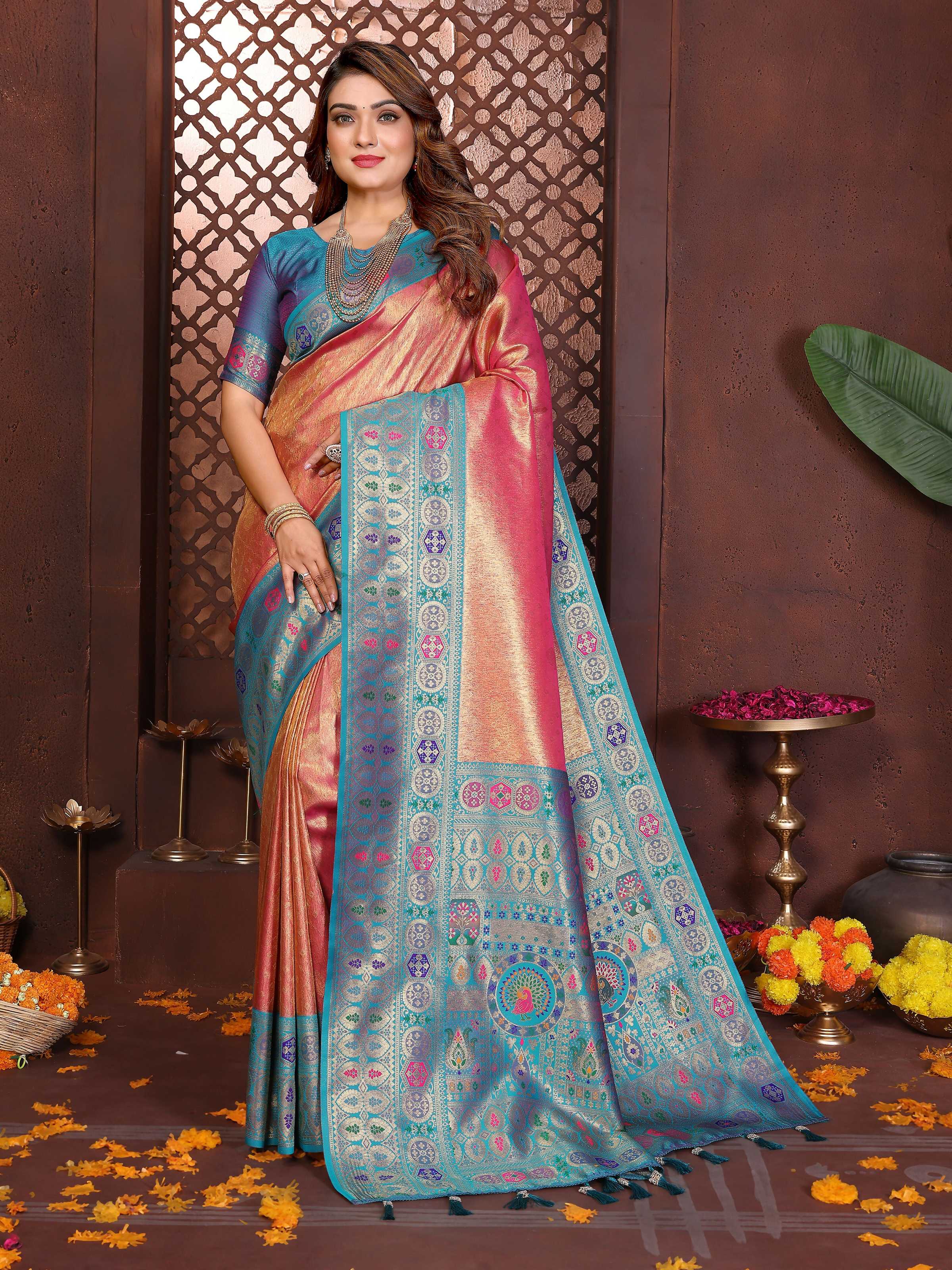 Elegant orange tissue silk saree with intricate traditional weaving patterns