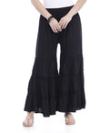 Classic black wide-leg palazzo pants in a breathable rayon cotton fabric.
