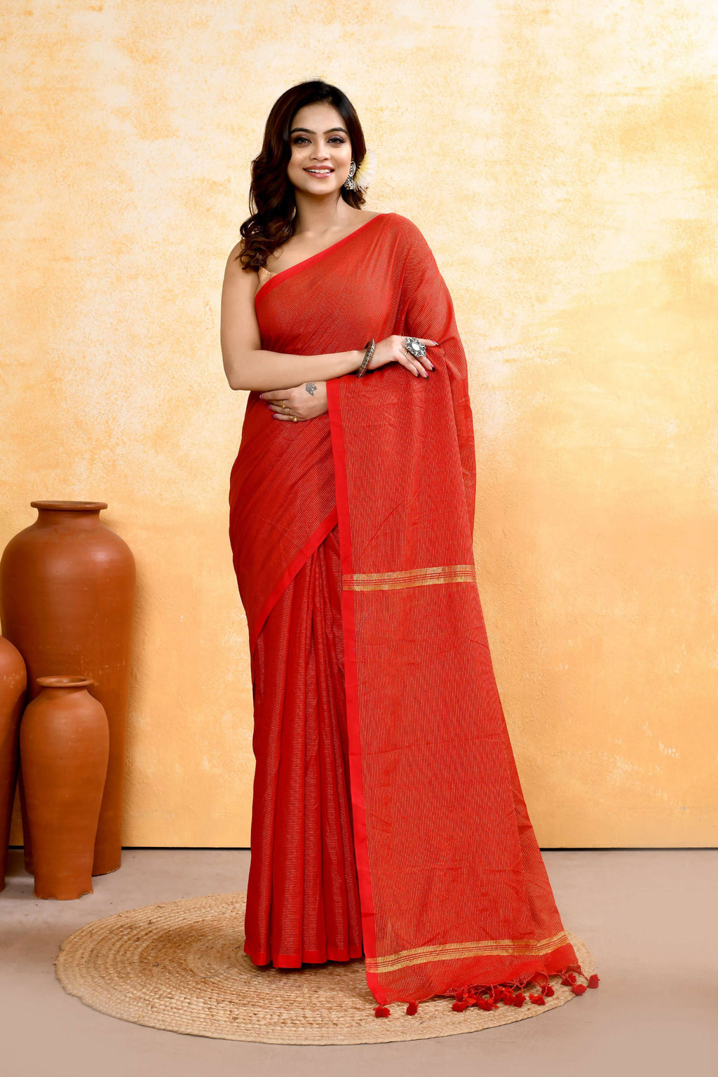 Piyari Fashion red cotton blend handloom saree with zari check embellishments