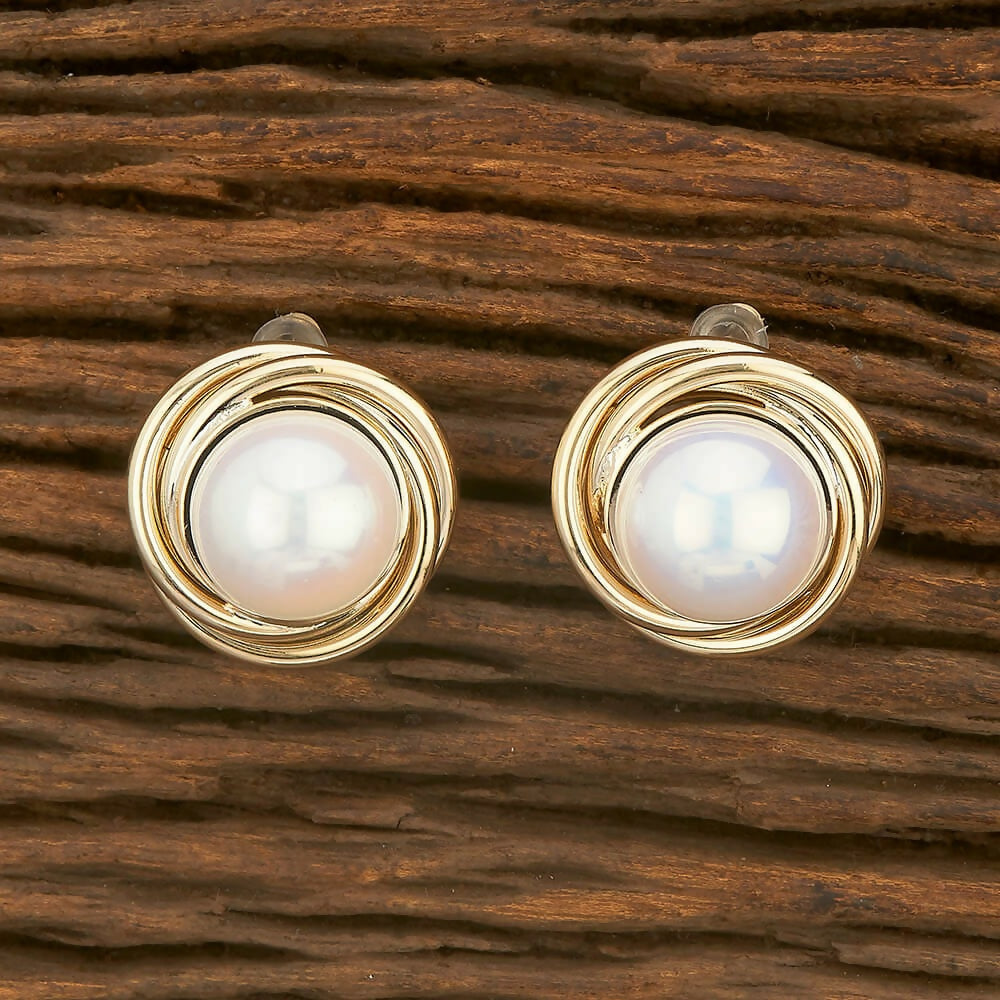 A pair of Golden White AD stone earrings crafted from brass for an elegant look.