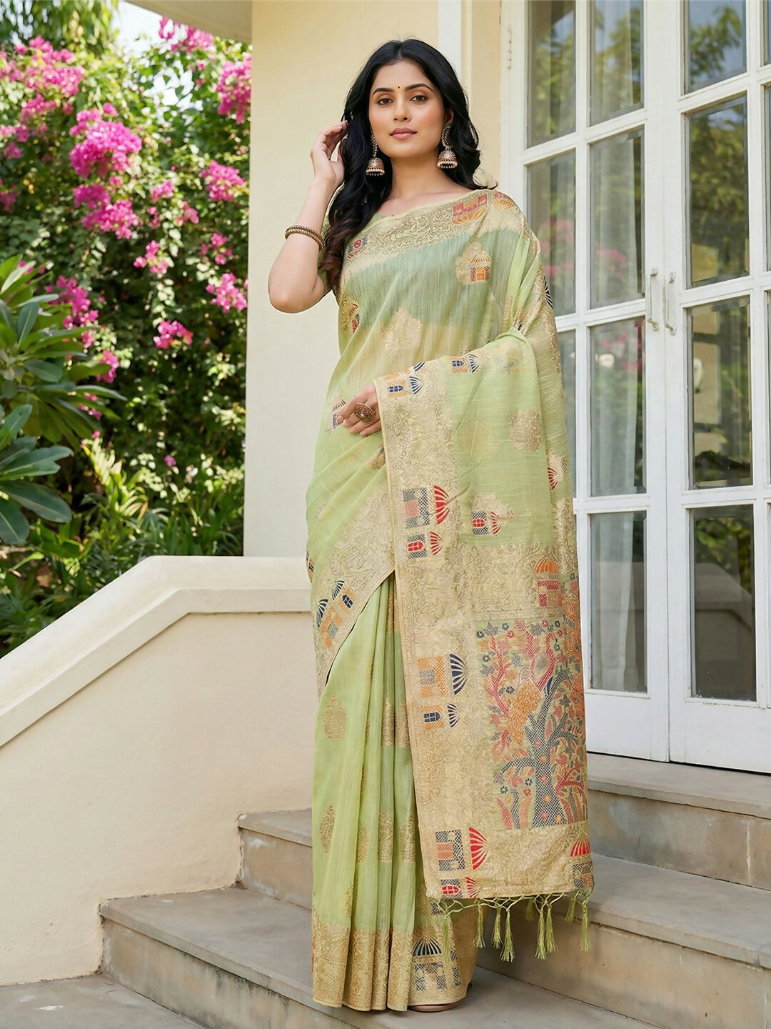 Light green linen cotton saree showing natural texture and fabric drape