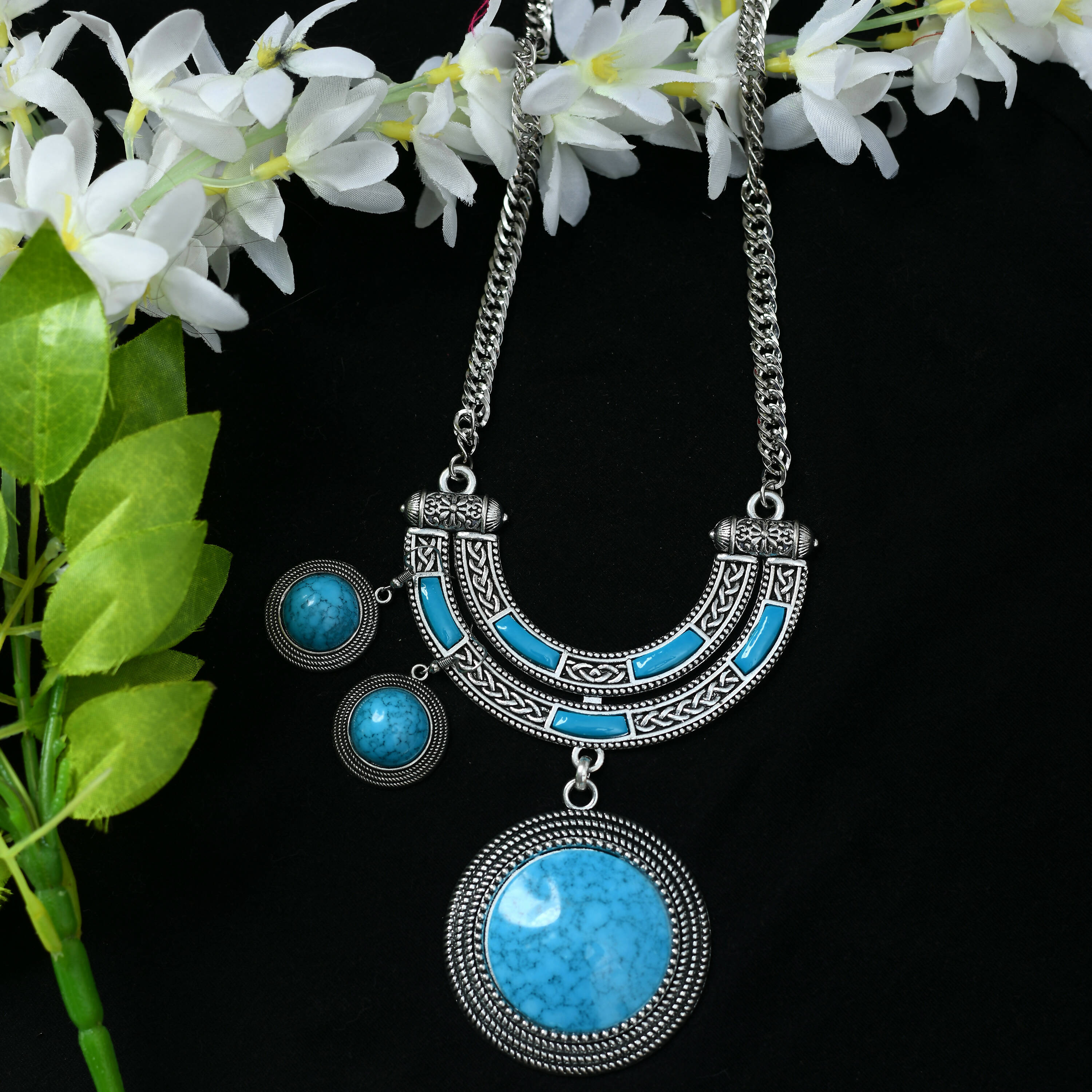 Long oxidised silver-plated necklace with sky blue stone work