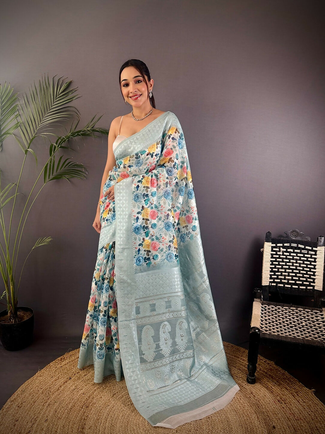 Grey Banarasi silk blend saree with intricate floral motifs and unstitched blouse fabric