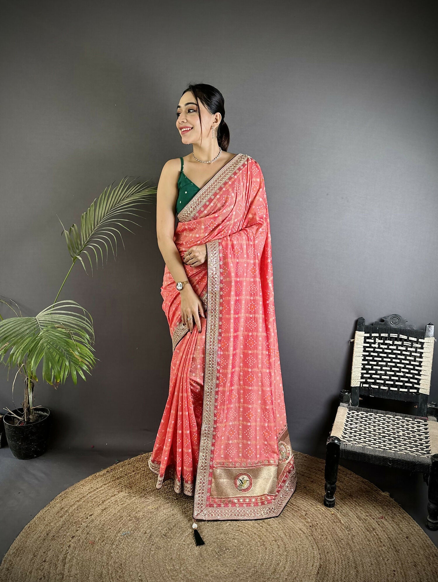 Baby pink Vichitra silk saree with traditional Bandhani prints and green blouse piece for children