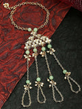 Mint green and gold Kundan Hathphool bracelet in a bohemian-indian style on a brass base
