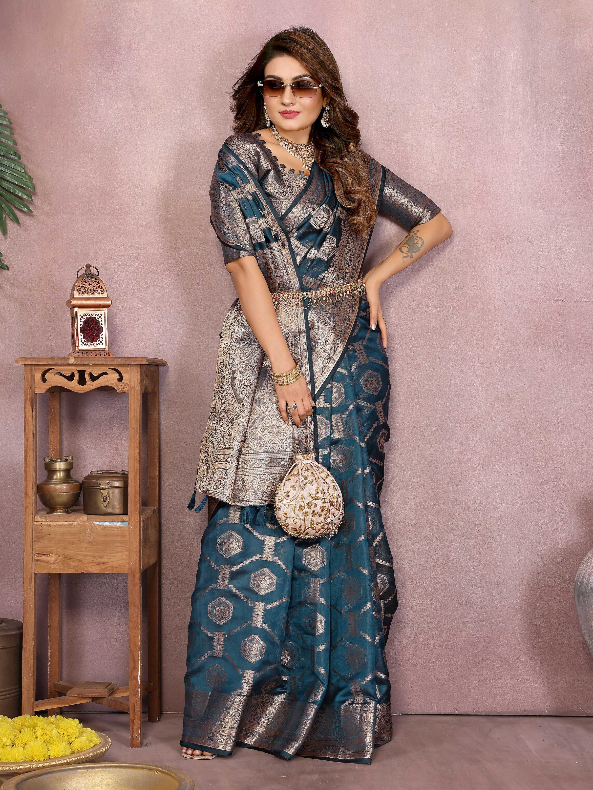 Teal Soft Organza Silk Saree with Intricate Weaving Detail