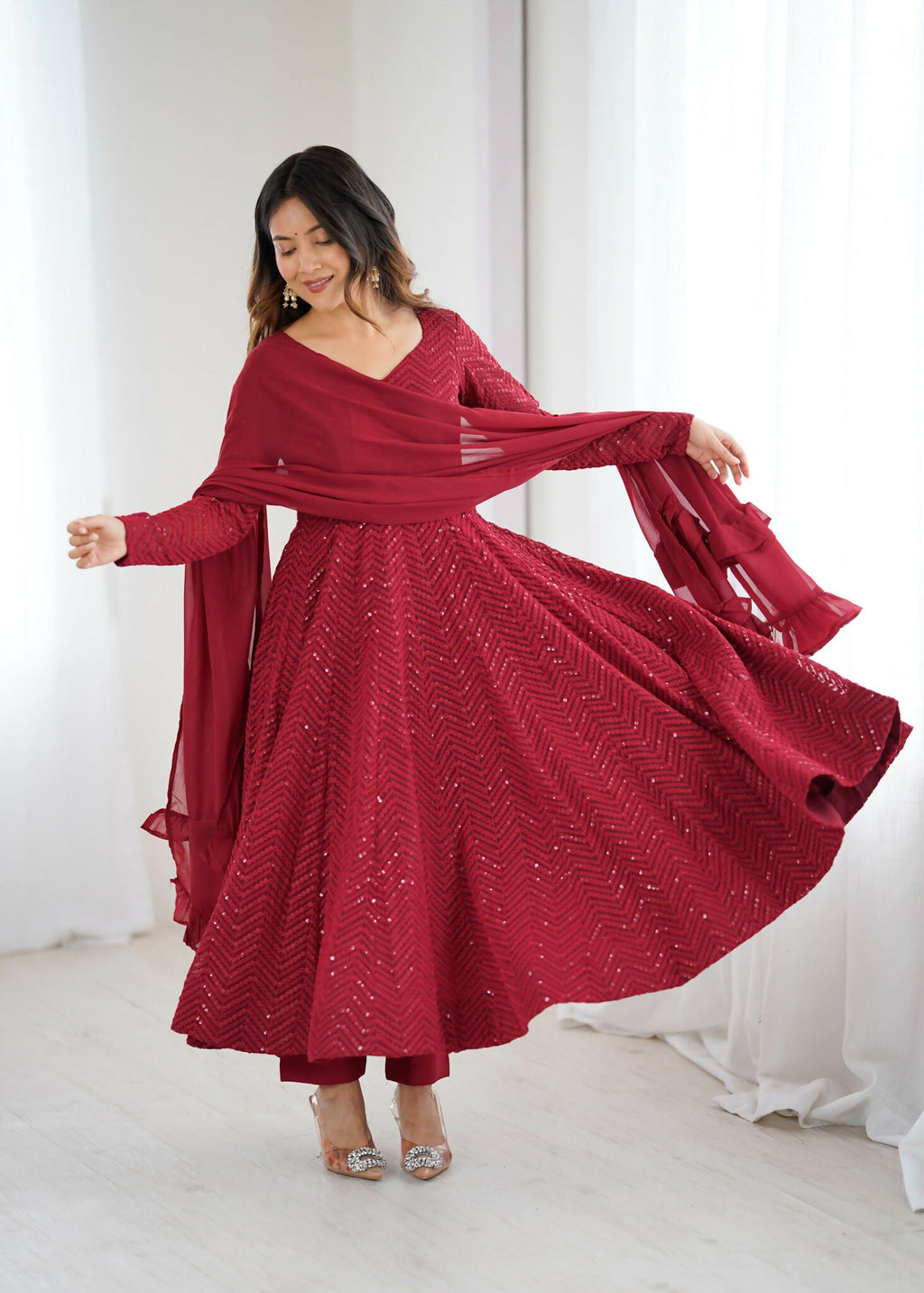 Maroon georgette kurta set with elaborate sequence embroidery detailing