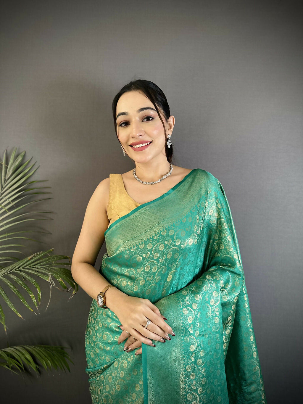 Rama Green Soft Satin Silk Banarasi Saree with Paisley Motifs