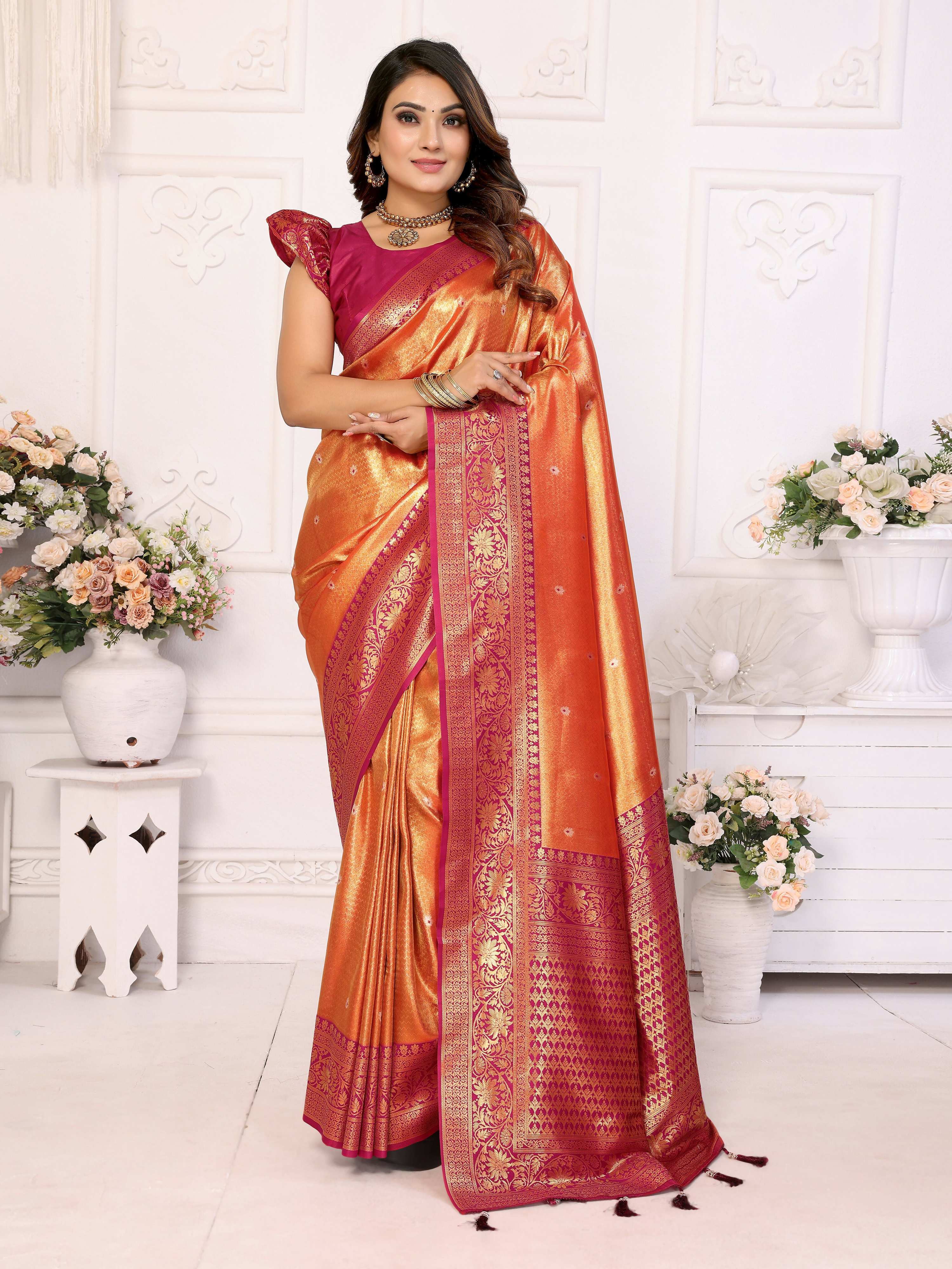 Orange tissue silk saree with intricate weaving work